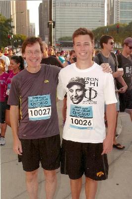 Earning my Iron Phi after reaching my philanthropic goal and running across the finish line