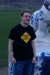 In front of the Kettering University Bulldog after a successful paint job