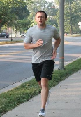 Me completing the Iron Phi 5K ALS Race!